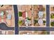 Bird's-eye view of houses in neighborhood with solar panels, green grass, and well-kept yards at 1031 W Cornell Dr, Tempe, AZ 85283