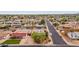 Aerial shot displaying neighborhood homes, a long road, and well-maintained landscaping across the community at 1031 W Cornell Dr, Tempe, AZ 85283