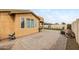 The backyard of the home with a spacious brick patio, perfect for outdoor activities and relaxation at 1031 W Cornell Dr, Tempe, AZ 85283