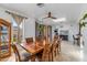 Large dining room featuring a wooden table set, tile floors, and a skylight to add natural light at 1031 W Cornell Dr, Tempe, AZ 85283
