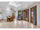 Elegant dining room with natural light, wood table and chairs, and sliding doors to the backyard at 1031 W Cornell Dr, Tempe, AZ 85283