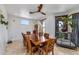Beautiful dining room featuring wood accents, natural light, a ceiling fan, and seating for eight at 1031 W Cornell Dr, Tempe, AZ 85283