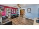 Open-concept living space with tile flooring and multiple sitting areas at 1031 W Cornell Dr, Tempe, AZ 85283
