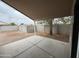 Covered back patio and fenced yard provide a space for outdoor living and entertaining at 10463 W Medlock Dr, Glendale, AZ 85307
