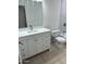Modern bathroom with white vanity, ceramic tile floors, and a tiled shower/tub combo at 10463 W Medlock Dr, Glendale, AZ 85307