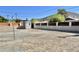 Large, fenced backyard features a shed and ample space for outdoor activities and landscaping at 11613 N 21St Ave, Phoenix, AZ 85029