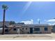 Charming single-story home with solar panels, desert landscaping, and mountain views in the background at 11613 N 21St Ave, Phoenix, AZ 85029