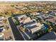 High angle view of a neighborhood showcasing well-manicured lawns, pools, and attractive homes at 12531 W Tuckey Ln, Glendale, AZ 85307