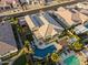 Stunning aerial view of a backyard paradise with a pool, spa, and meticulously landscaped areas at 12531 W Tuckey Ln, Glendale, AZ 85307