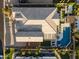 Aerial image of a house with a swimming pool, surrounded by a landscaped yard and an outdoor living space at 12531 W Tuckey Ln, Glendale, AZ 85307