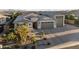 Attractive single-Gathering home with mature landscaping and stone accents, complete with a spacious three-car garage at 12531 W Tuckey Ln, Glendale, AZ 85307