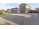 Charming home features a three car garage and long, decorative driveway at 12531 W Tuckey Ln, Glendale, AZ 85307