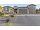 Charming home features a three car garage and professional landscaping with desert landscaping at 12531 W Tuckey Ln, Glendale, AZ 85307