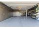 Spacious garage with ample cabinet storage and epoxy flooring, providing organization and style at 12531 W Tuckey Ln, Glendale, AZ 85307