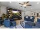 Cozy living room with a beautiful fireplace, and built-in entertainment center at 12531 W Tuckey Ln, Glendale, AZ 85307