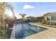 Inviting pool area with lounge chairs, poolside bar, and meticulous landscaping, perfect for outdoor entertaining at 12531 W Tuckey Ln, Glendale, AZ 85307