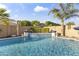 Backyard pool features tile accents and water features at 12531 W Tuckey Ln, Glendale, AZ 85307