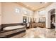 Bright bathroom with tiled floors, soaking tub, and spacious vanities at 1523 N 103Rd St, Mesa, AZ 85207