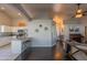 Spacious living room with high ceilings, modern decor, and access to kitchen at 1550 E Park Ave, Gilbert, AZ 85234