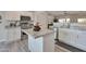 Modern kitchen with stainless steel appliances, granite countertops, and convenient island at 16131 W Indianola Ave, Goodyear, AZ 85395
