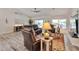Cozy living room with comfortable seating, large windows, and stylish decor at 16131 W Indianola Ave, Goodyear, AZ 85395
