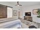 This lovely main bedroom offers plenty of space and features a ceiling fan to keep you cool and comfortable at 16131 W Indianola Ave, Goodyear, AZ 85395