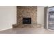 Close up on a living room fireplace featuring stone surround and hearth at 16616 E Palisades Blvd # 109, Fountain Hills, AZ 85268
