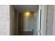 Bright foyer with light walls, a decorative light fixture, and a glimpse of the home's interior at 16616 E Palisades Blvd # 109, Fountain Hills, AZ 85268