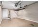 Organized garage with painted walls, epoxy flooring, and storage cabinet with open shelf space at 16616 E Palisades Blvd # 109, Fountain Hills, AZ 85268