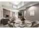 Open-concept living area showcasing a fireplace, lofty ceilings, and stylish decor for comfortable living and entertaining at 16616 E Palisades Blvd # 109, Fountain Hills, AZ 85268