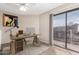 Bright office space with a sliding door to a balcony, offering an inspiring work environment with natural light at 16616 E Palisades Blvd # 109, Fountain Hills, AZ 85268