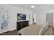 Relaxing bedroom with plush carpeting, ceiling fan, and walk-out porch at 17443 N Goldwater Dr, Surprise, AZ 85374