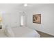 Bright bedroom with closet doors and view to adjoining space at 17443 N Goldwater Dr, Surprise, AZ 85374