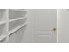 A well-organized walk-in closet with built-in shelves and ample storage space at 17443 N Goldwater Dr, Surprise, AZ 85374