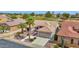 Charming home with tile roof, desert landscaping, and an attached two-car garage at 17443 N Goldwater Dr, Surprise, AZ 85374