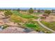 View of a well-manicured golf course, visible from the house with roof solar panels at 17443 N Goldwater Dr, Surprise, AZ 85374