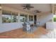 Spacious covered patio offering comfortable seating and view to yard at 17443 N Goldwater Dr, Surprise, AZ 85374