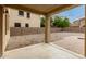 View of the backyard's gravel and paver landscaping from the covered patio at 19072 N Ventana Ln, Maricopa, AZ 85138