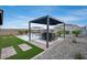 Backyard oasis with covered bar, pool, and patio; an entertainer's dream at 19443 W Valle Vista Way, Litchfield Park, AZ 85340