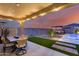 Covered patio with an outdoor dining area, perfect for entertaining guests at 19443 W Valle Vista Way, Litchfield Park, AZ 85340
