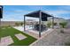 Outdoor entertainment area with poolside bar and seating, perfect for summer gatherings at 19443 W Valle Vista Way, Litchfield Park, AZ 85340