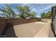 Large backyard boasts a brick privacy wall, mature trees, pavers and pebble tec pool at 19622 N 66Th Ln, Glendale, AZ 85308