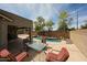 Backyard oasis with pool, outdoor seating, and a covered patio, perfect for enjoying the Arizona sunshine at 19622 N 66Th Ln, Glendale, AZ 85308