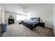 Spacious bedroom with large bed, ceiling fan, and lots of natural light at 19622 N 66Th Ln, Glendale, AZ 85308