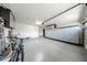 Spacious three car garage includes epoxy floors and storage options at 19622 N 66Th Ln, Glendale, AZ 85308