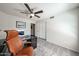Organized home office with a comfortable chair, modern desk, and natural light, perfect for work at 19622 N 66Th Ln, Glendale, AZ 85308