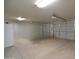 Spacious garage with multiple doors and ample lighting, ready for storage or workshop projects at 21032 W Shasta St, Buckeye, AZ 85326