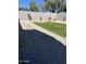Well-maintained backyard featuring pavers, decorative gravel and lawn at 21816 E Puesta Del Sol --, Queen Creek, AZ 85142