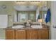 This bathroom features double sinks with great lighting, granite countertop, and decor at 21816 E Puesta Del Sol --, Queen Creek, AZ 85142