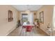 Dining area filled with natural light, vintage dining table, and access to outdoor living space at 21816 E Puesta Del Sol --, Queen Creek, AZ 85142